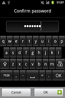 Key in the phone lock code again and press OK.