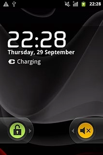 Press and drag the unlock icon right.