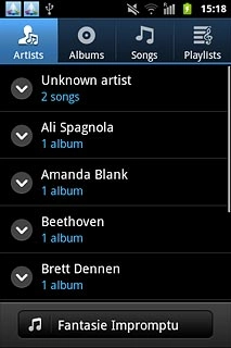 Press one of the following categories at the top of the display:Artists