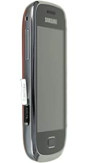 Slide the memory card into the holder and press it until it clicks into place.