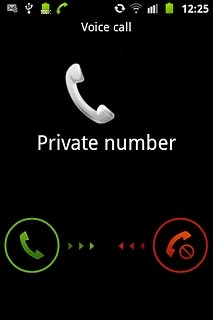 When you have an ongoing call, the new call is signalled by a sound.Press and drag the accept call icon right.