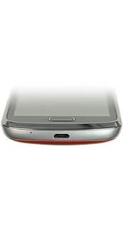 Connect the charger or data cable to the phone socket and to a wall socket or your computer's USB port.