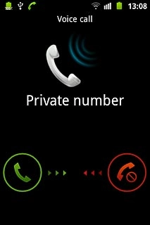 Press the reject call icon and drag the icon left.