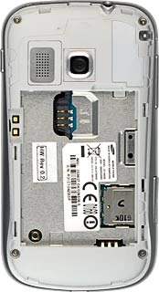 Place your SIM as shown in the SIM holder and slide it in.