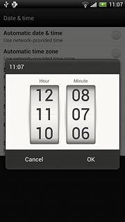 Press hours and minutes and slide your finger up or down to set the time.