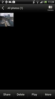 Go to the required folder.Press and hold the required picture or the required video clip until a pop-up menu is displayed.