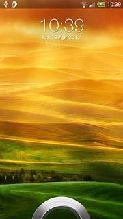 Press the ring at the bottom of the display and drag it upwards.