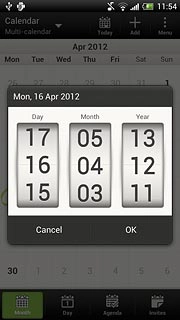 Press and drag day, month and year up or down to select the required date.