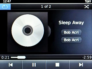 Scroll to the repeat icon and press the Navigation key repeatedly to select the required setting.