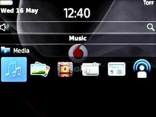 Scroll to Music and press the Navigation key.