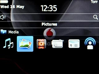 Highlight Pictures or Videos and press the Navigation key.Go to the required folder.