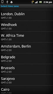 Press the required time zone.