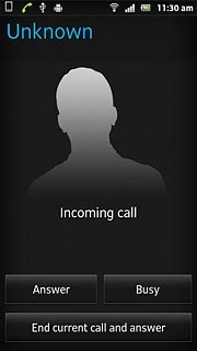 When you have an ongoing call, the new call is signalled by a sound.Press Answer.