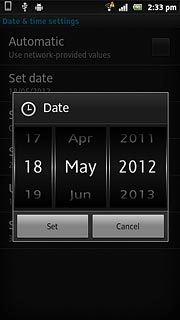 Slide day, month and year up or down to set the date.