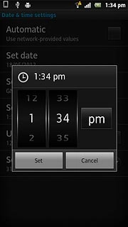 Slide hours and minutes up or down to set the time.