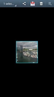 When a picture or video clip is displayed in a a blue frame, it's selected.