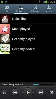 Press Playlists at the top of the display.