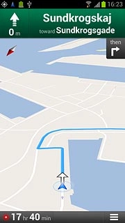The navigation window with information about your route is displayed.The next turn and the next route detail are displayed at the top of the display.