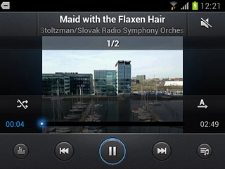 To go to the previous audio file:Press arrow left twice.