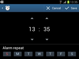 Press the required days below Alarm repeat.