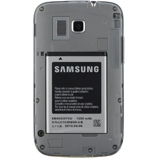 Turn the memory card as illustrated next to the memory card holder.