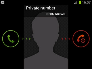 When you have an ongoing call, the new call is signalled by a sound.Press and drag the accept call icon right.