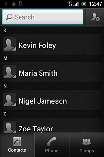 Press the new contact icon.