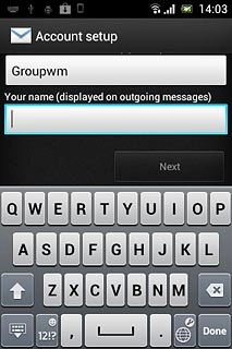 Press the field below Your name (displayed on outgoing messages) and key in the required sender name.