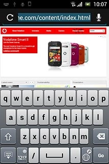 Press the address bar at the top of the display.