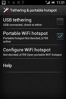 When the box next to the menu item is ticked (V), the Wi-Fi hotspot is turned on.