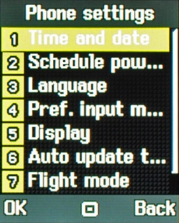 Scroll to Time and date and press the Navigation key.