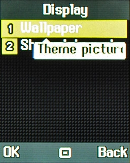Scroll to Wallpaper and press the Navigation key.