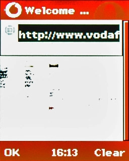 Highlight the address bar at the top of the display and press the Navigation key.