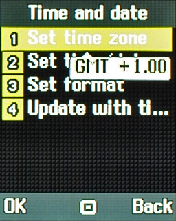 Scroll to Set time zone and press the Navigation key.