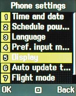 Scroll to Display and press the Navigation key.
