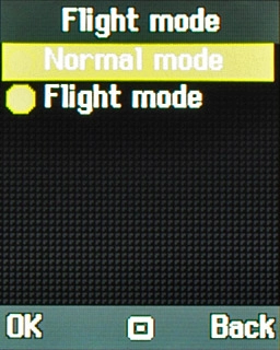 Highlight Normal mode or Flight mode and press the Navigation key.