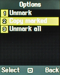 Scroll to Copy marked and press the Navigation key.