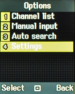Scroll to Settings and press the Navigation key.