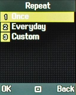 Highlight Once, Everyday or Custom and press the Navigation key.