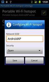 Press the field below Network SSID and key in the required name for the Wi-Fi hotspot.