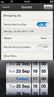 Drag the wheels to set the date and time.
