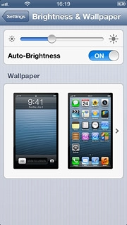 Press the field below Wallpaper.Go to the required folder.