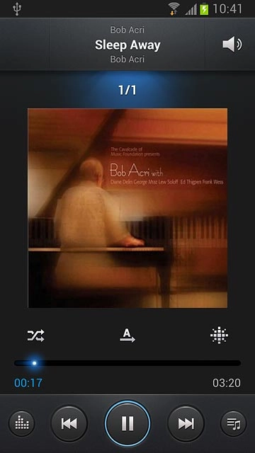 To fast forward or rewind the current audio file:Press the indicator at the bottom of the display and slide it right or left.