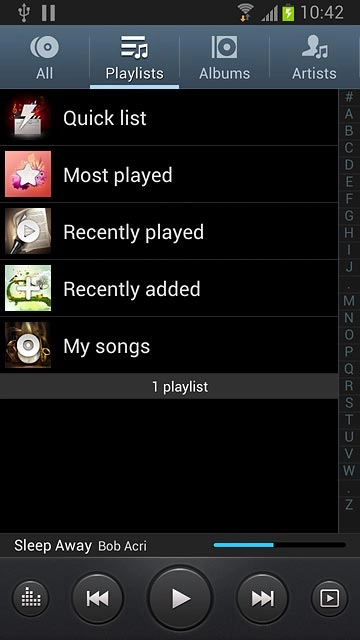 Press Playlists at the top of the display.