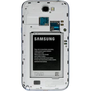 Turn the memory card as illustrated next to the memory card holder.