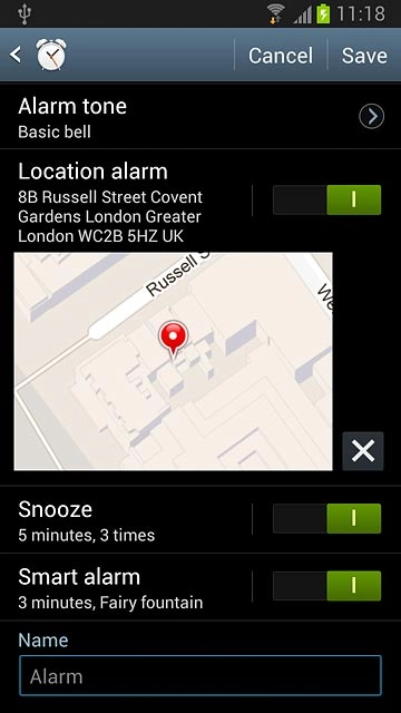 Press Alarm.Key in the required name.