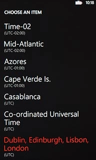 Press the required time zone.