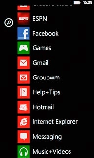 Slide your finger left on the display.Press Music+Videos.