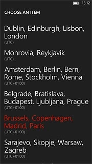 Press the required time zone.