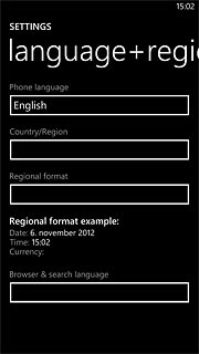 Press the field below Phone language.